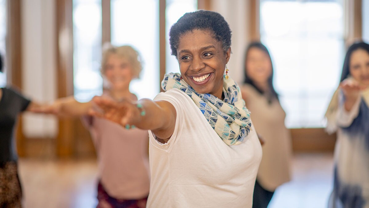 Mature woman in an exercise class