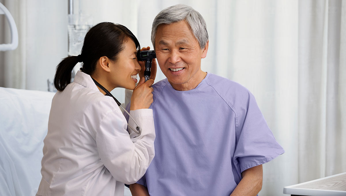 Doctor looking in a patients ear