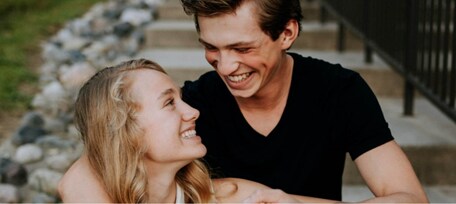 Image of two smiling teens